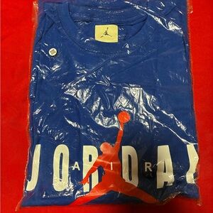 Jordan Blue Tee with Vibrant Red Logo